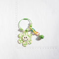 Smiley Flower Beaded Ring Bell Keychain - Green