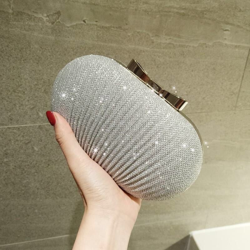 Pleated Glitter Egg Clutch with Bow Clasp