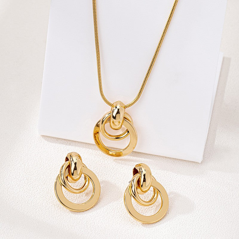 Gold Knot Circle Pendant Necklace And Earring Set