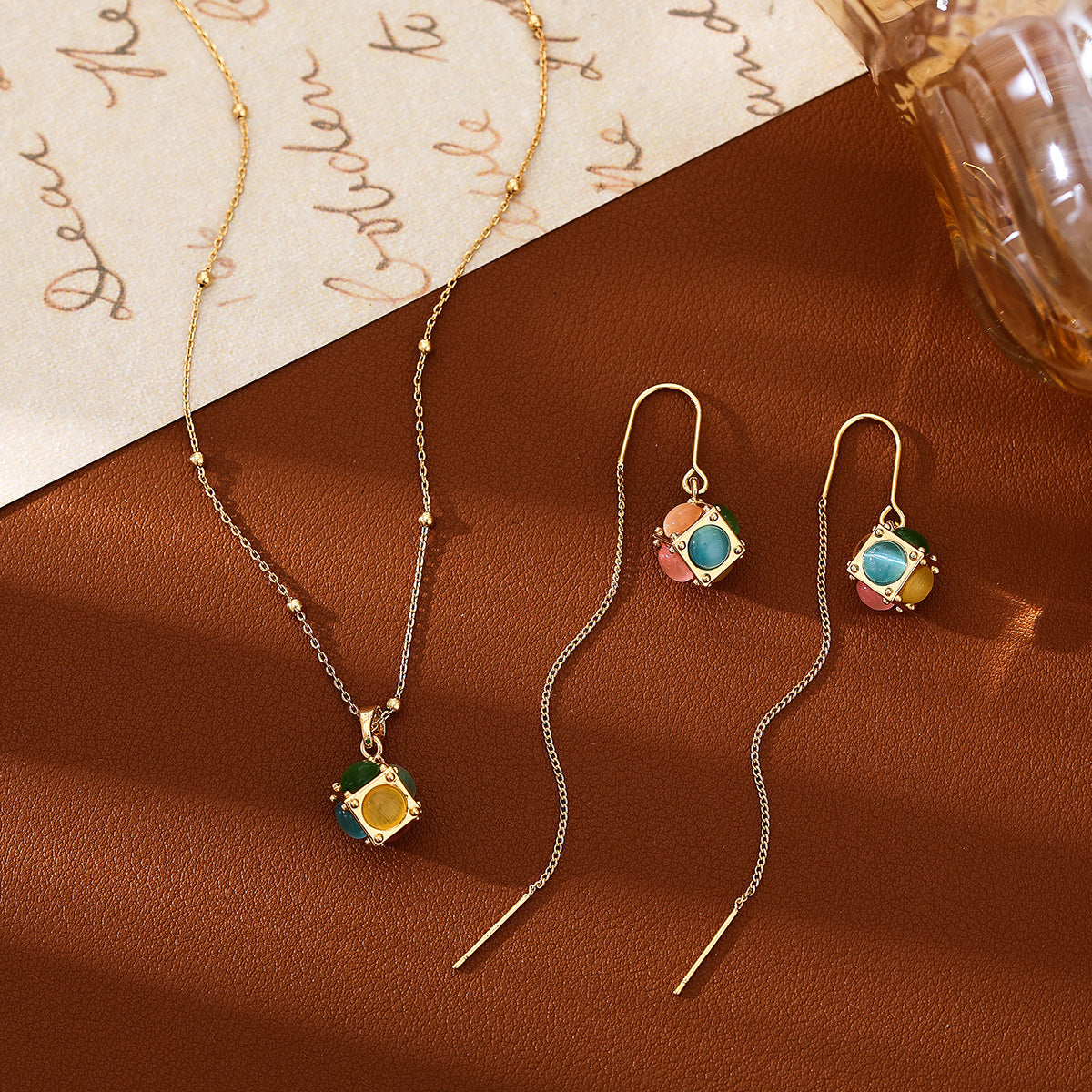 Cat Eye Cube Pendant Necklace and Earrings - view 1