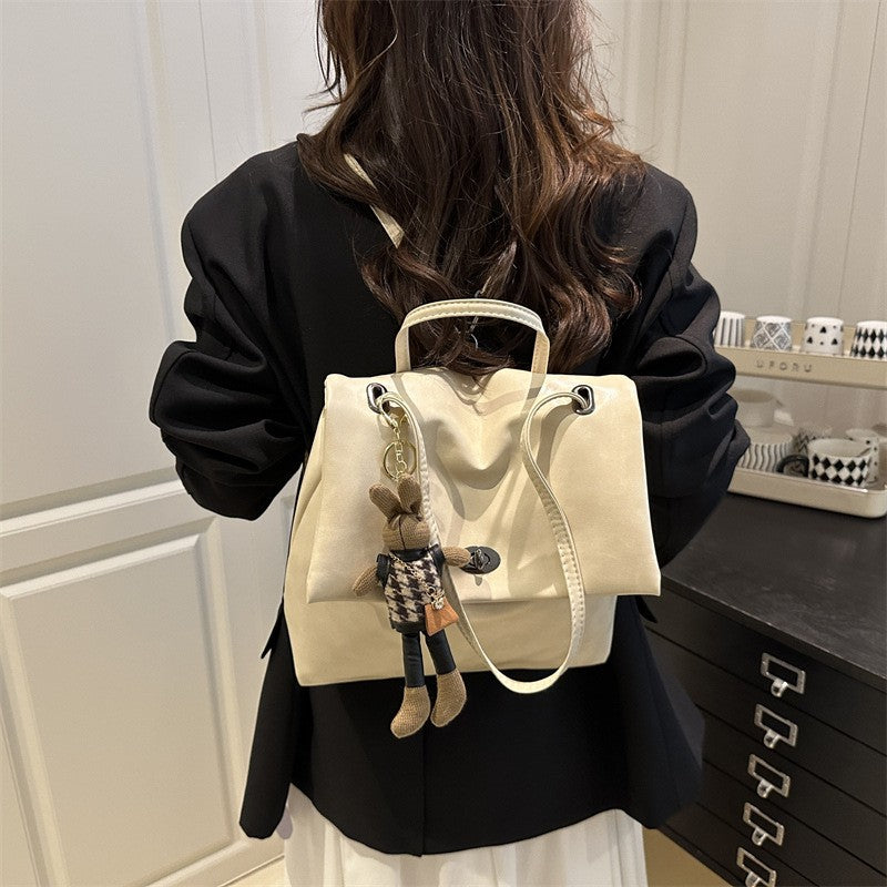 Slouchy Faux Leather Flap Backpack