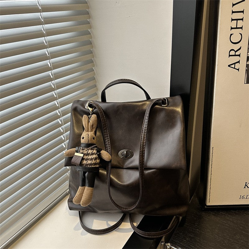 Slouchy Faux Leather Flap Backpack