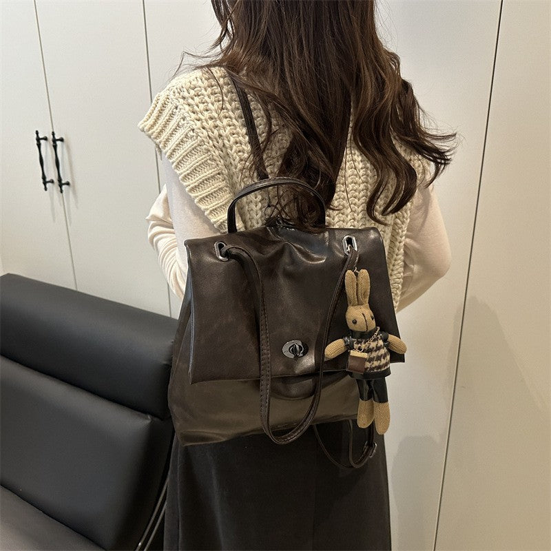 Slouchy Faux Leather Flap Backpack