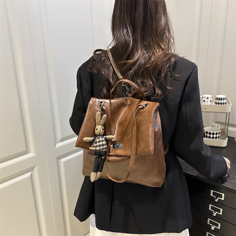 Slouchy Faux Leather Flap Backpack