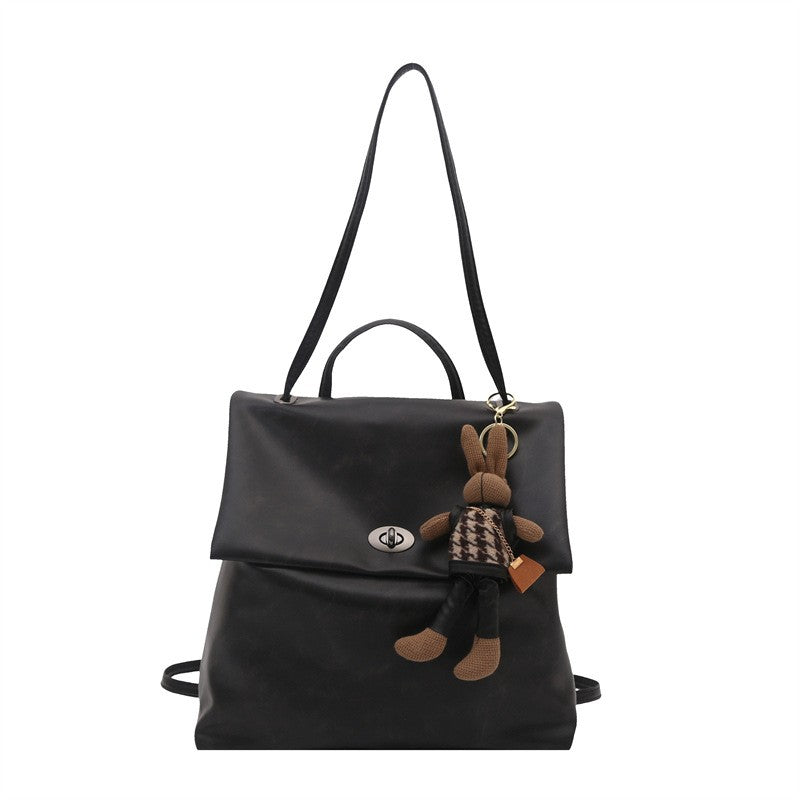 Slouchy Faux Leather Flap Backpack