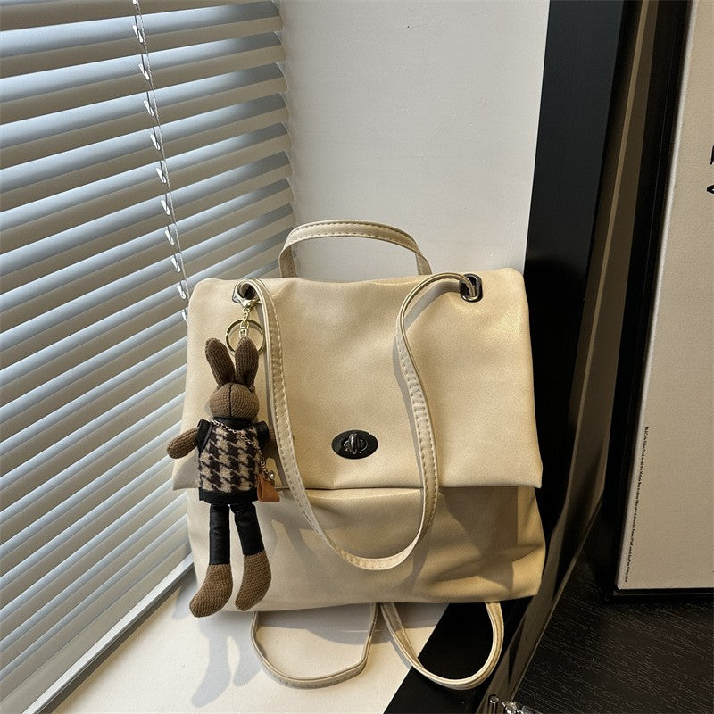 Slouchy Faux Leather Flap Backpack