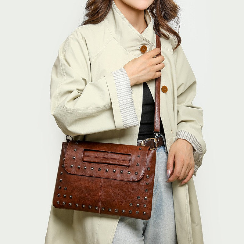 Studded Faux Leather Envelope Clutch with Strap
