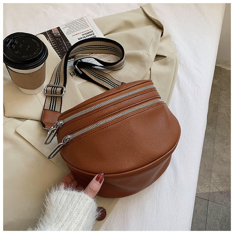 Pebbled Half Moon Crossbody Bag with Striped Strap - Brown
