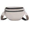 Pebbled Half Moon Crossbody Bag with Striped Strap - Cream