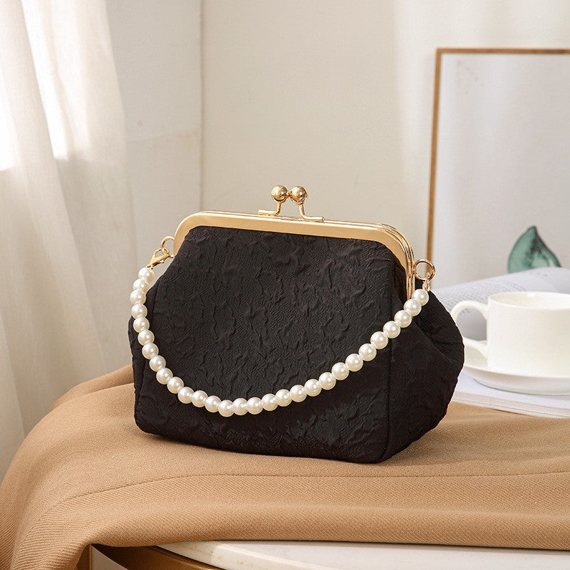 Embossed Kiss Lock Frame Bag with Pearl Handle - Black Handle