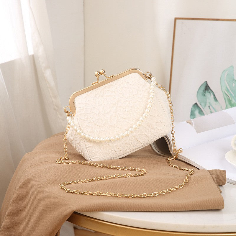 Embossed Kiss Lock Frame Bag with Pearl Handle - Ivory Chain