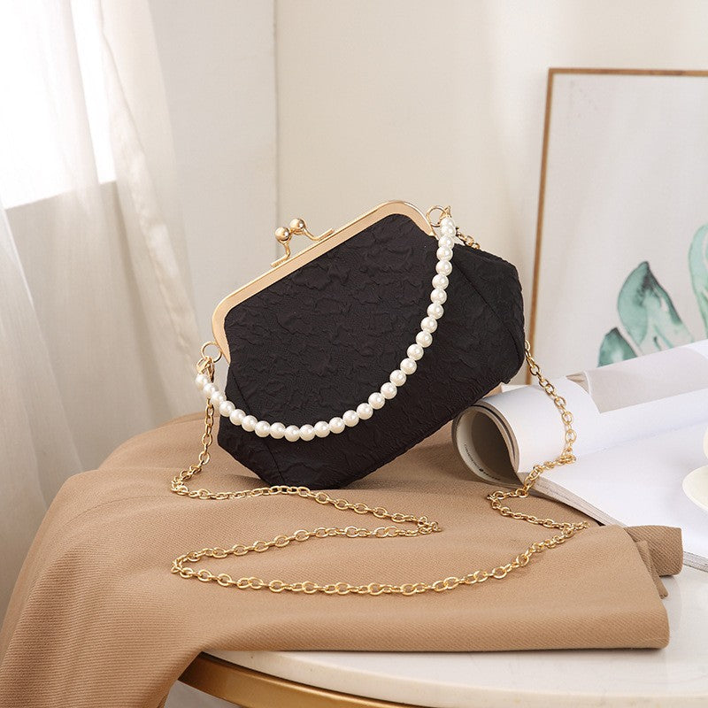 Embossed Kiss Lock Frame Bag with Pearl Handle