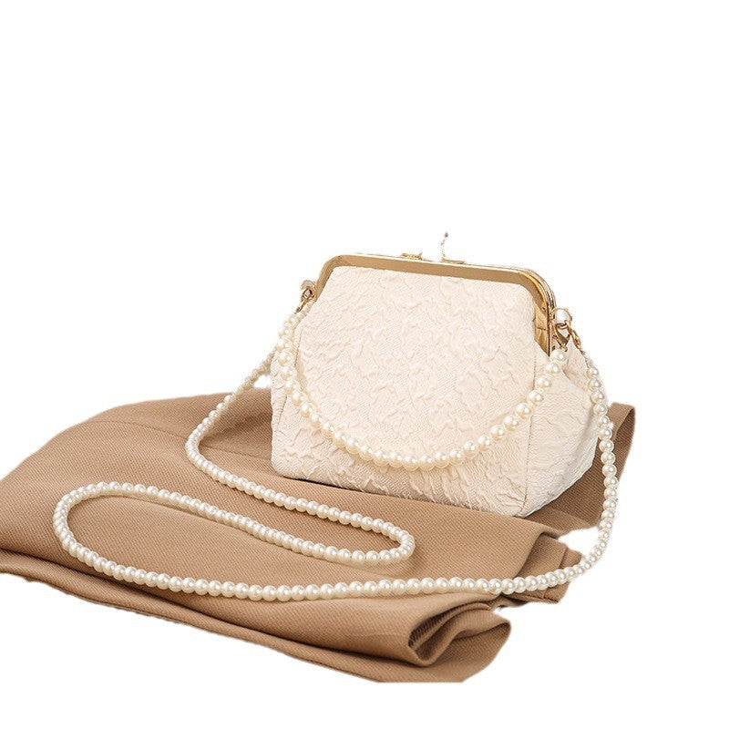 Embossed Kiss Lock Frame Bag with Pearl Handle