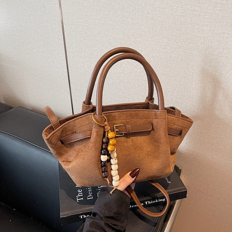 Faux Suede Belted Winged Top Handle Bag