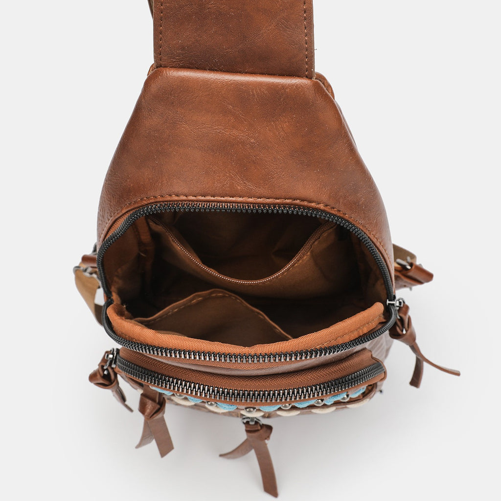 Western Tooled Sling Backpack with Whipstitch Trim