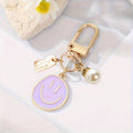 Smiley Face Enamel Bag Charm Keychain - Purple