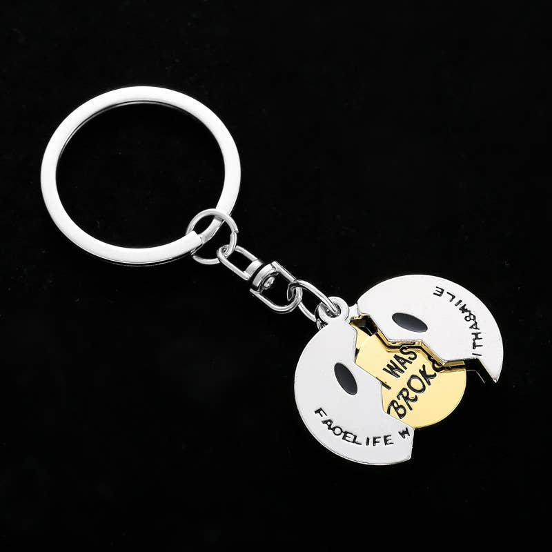 Cracked Smiley Face Locket Keychain