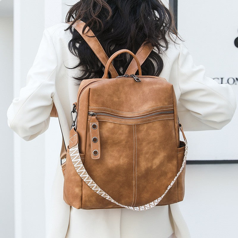 Distressed Faux Leather Guitar Strap Backpack