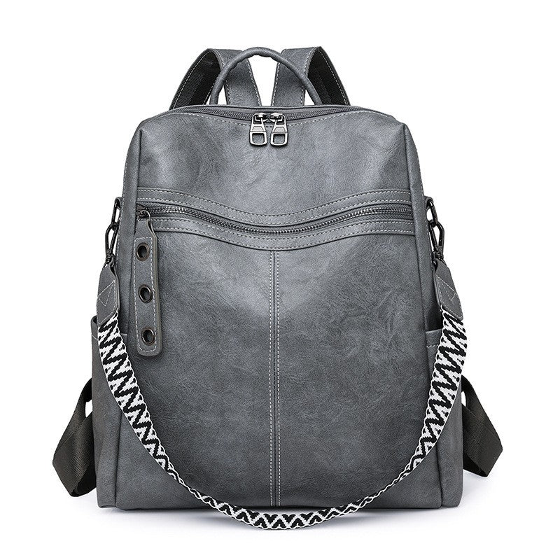 Distressed Faux Leather Guitar Strap Backpack