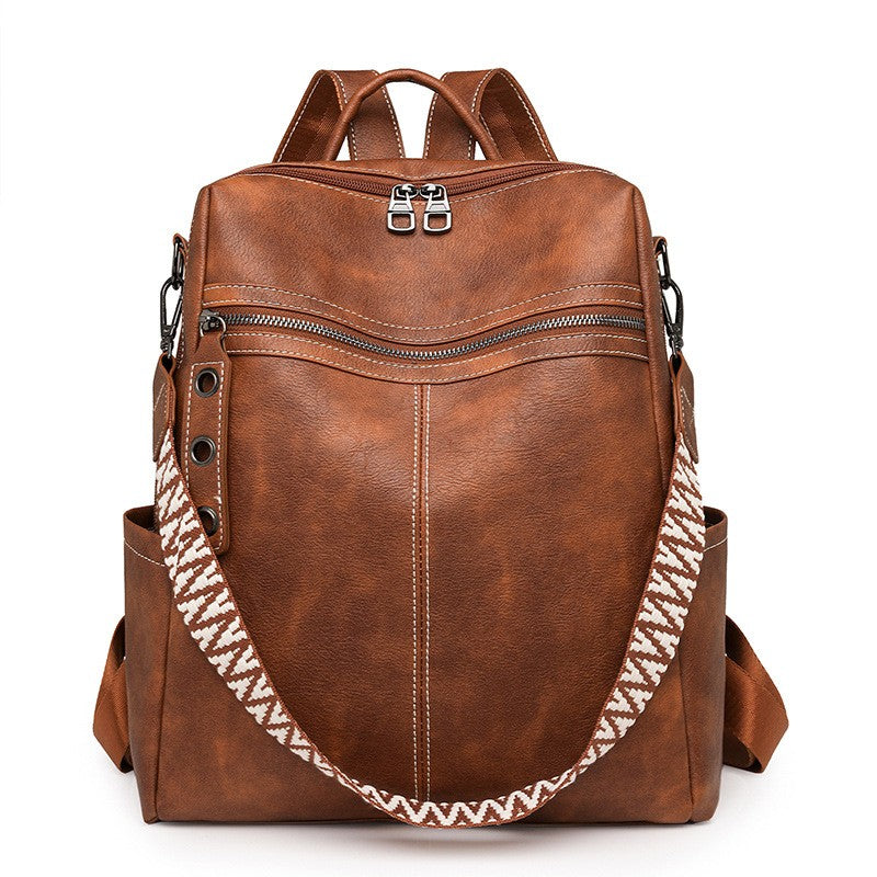 Distressed Faux Leather Guitar Strap Backpack