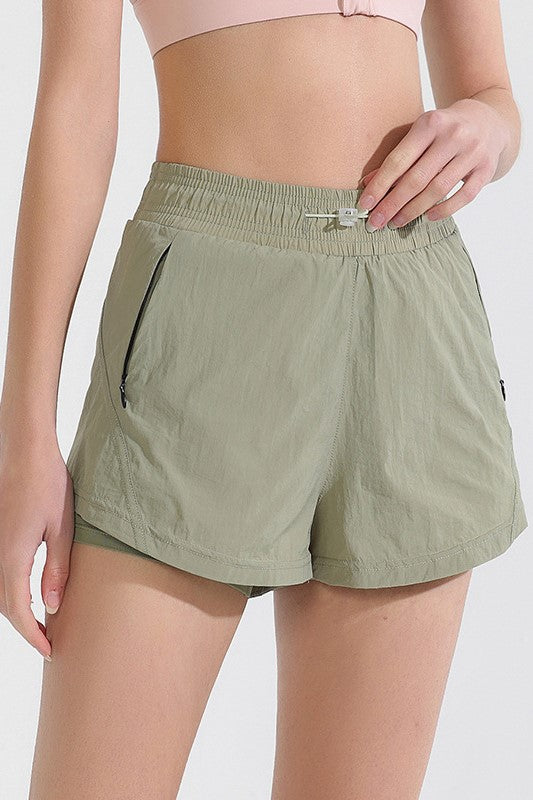 Curved Hem Lined Running Shorts With Zip Pocket - Sage - 6